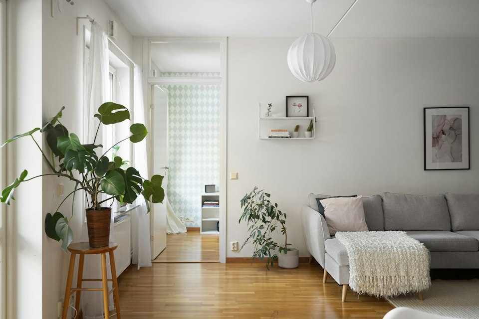 Furnished living room with a wood floor