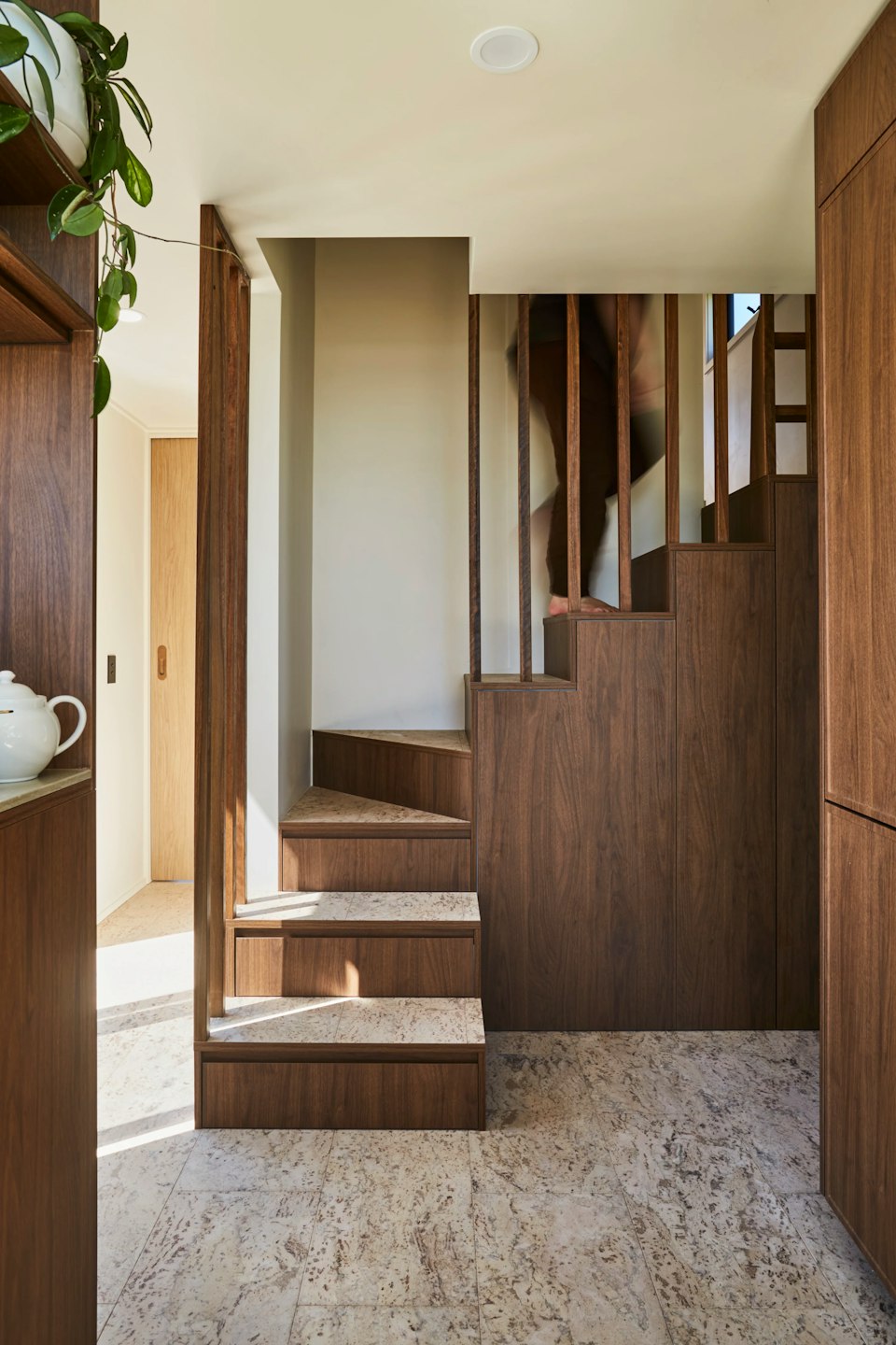 Modern wooden staircase in a bright interior